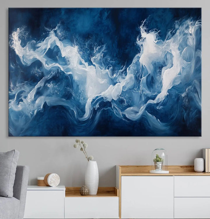 The room features an Abstract Ocean Storm Canvas Art in deep blue and white.