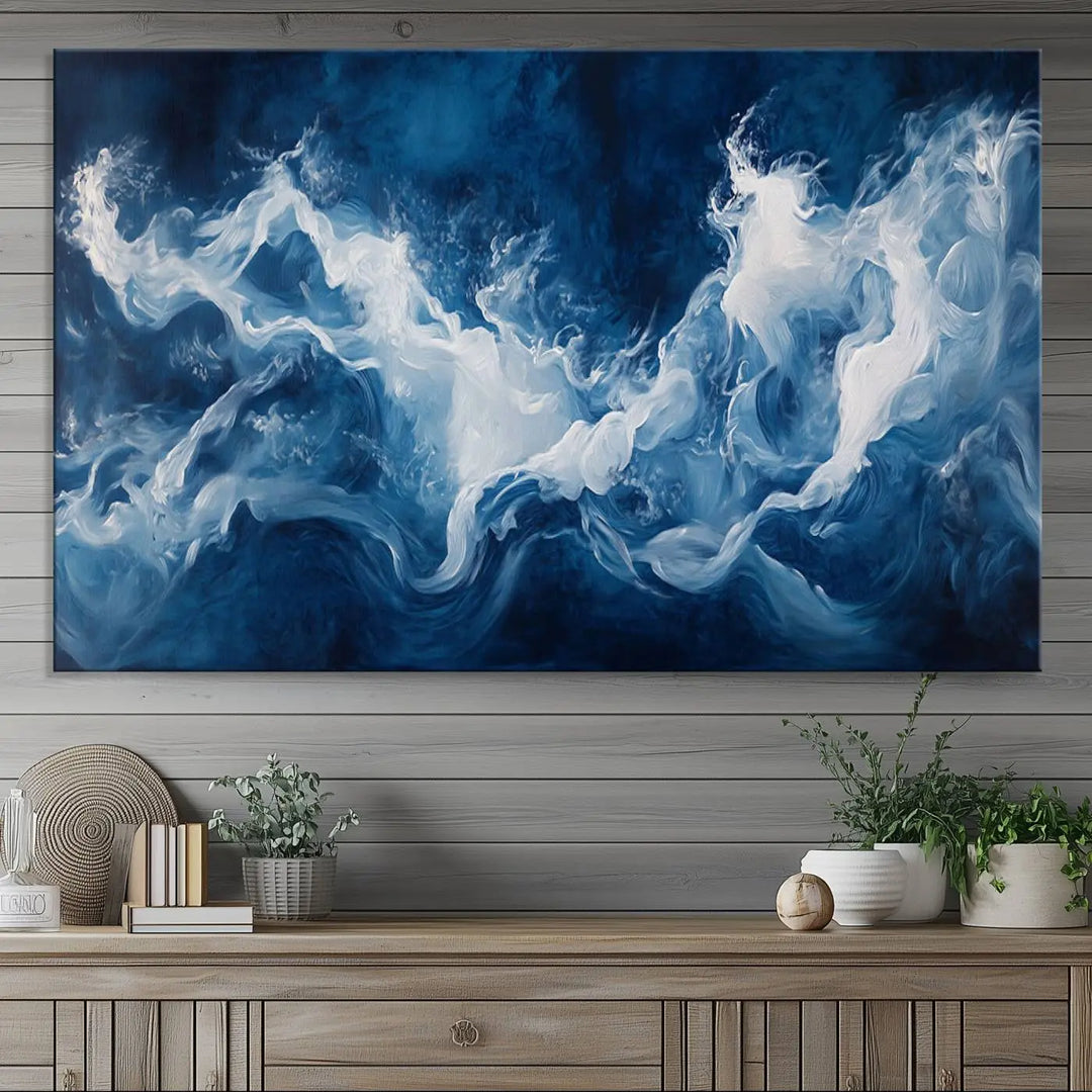 The room features an Abstract Ocean Storm Canvas Art in deep blue and white.