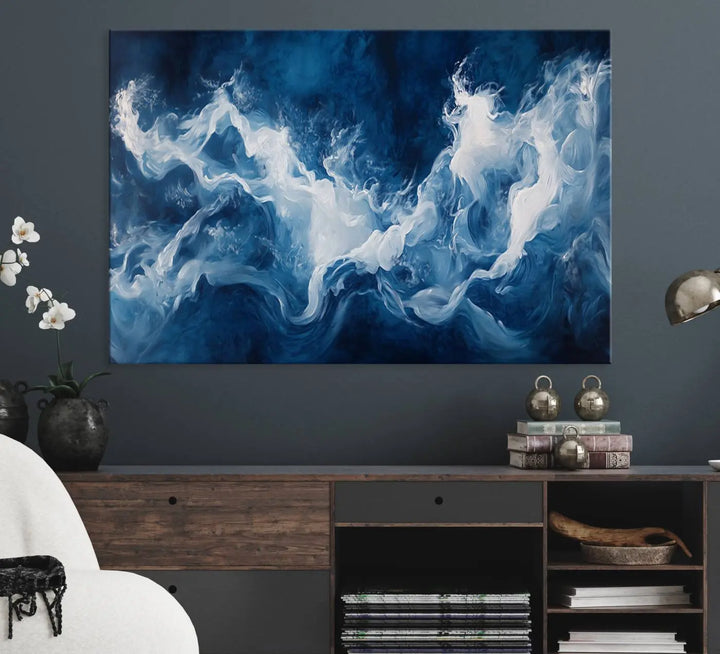 The room features an Abstract Ocean Storm Canvas Art in deep blue and white.