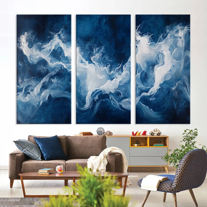 The room features an Abstract Ocean Storm Canvas Art in deep blue and white.