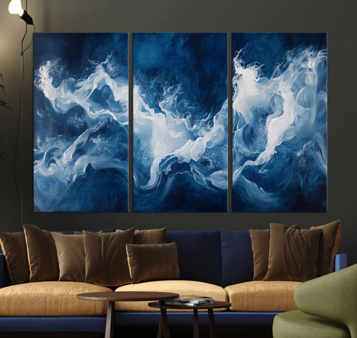 The room features an Abstract Ocean Storm Canvas Art in deep blue and white.