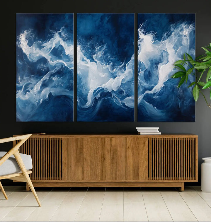 The room features an Abstract Ocean Storm Canvas Art in deep blue and white.