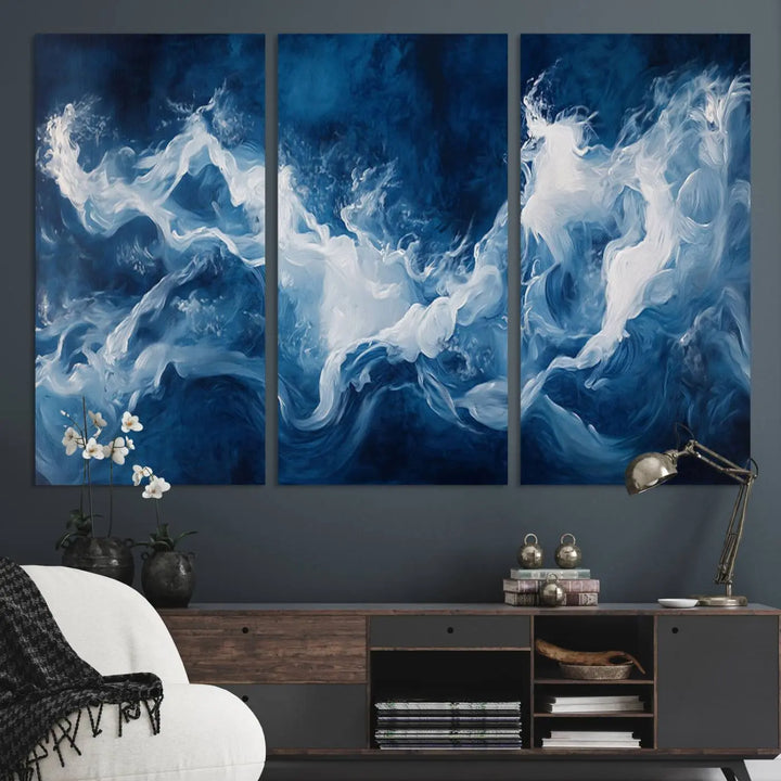 The room features an Abstract Ocean Storm Canvas Art in deep blue and white.