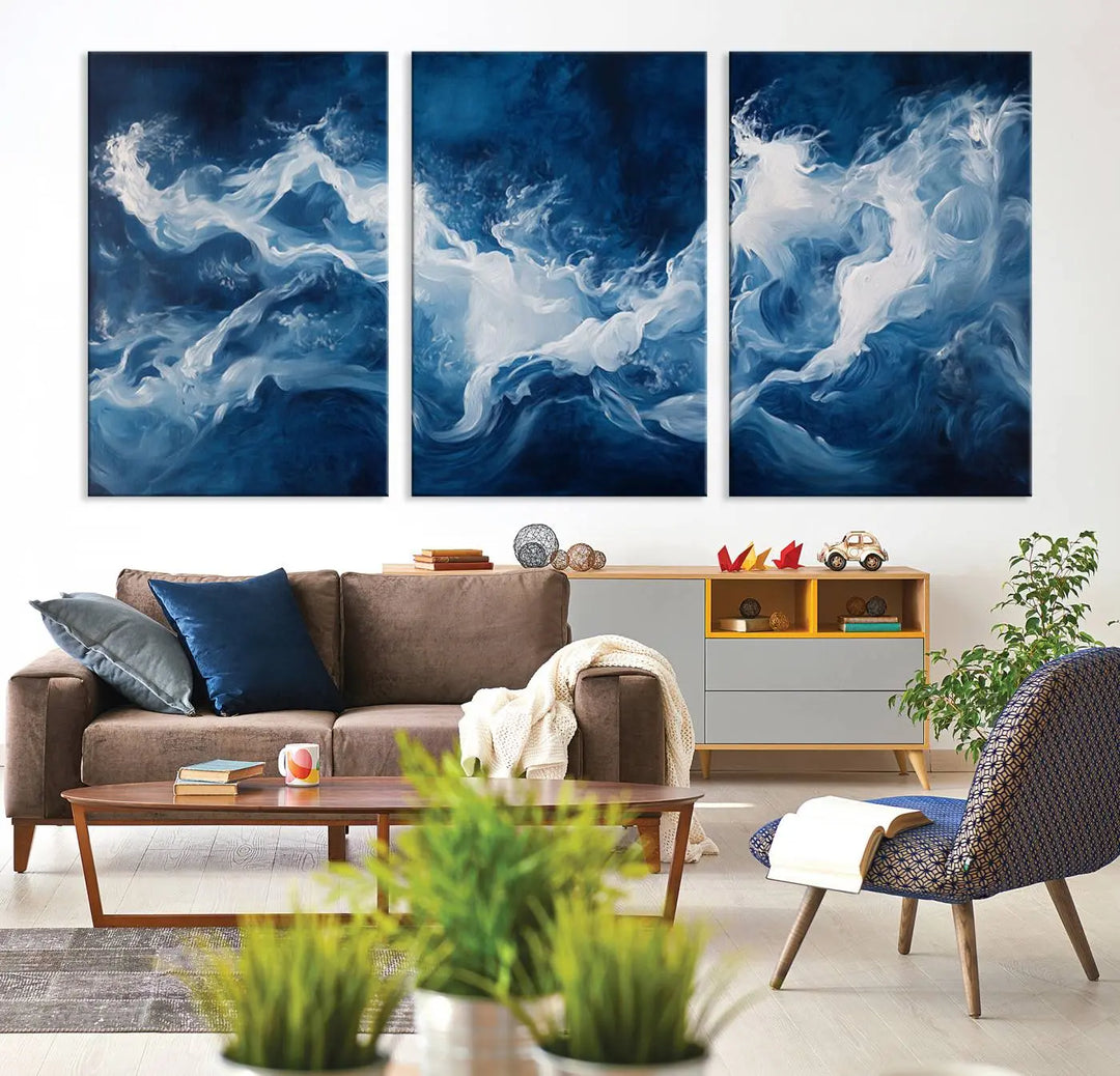 The room features an Abstract Ocean Storm Canvas Art in deep blue and white.