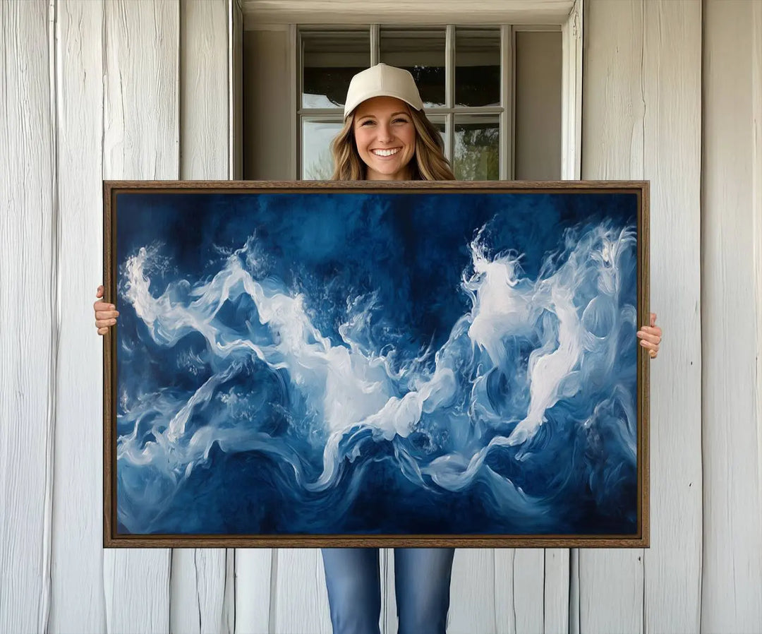 The room features an Abstract Ocean Storm Canvas Art in deep blue and white.