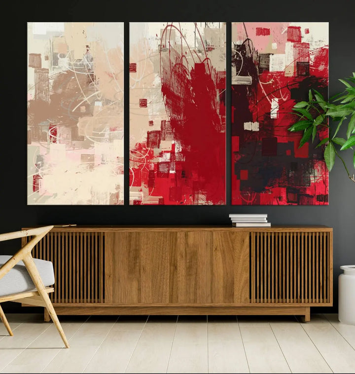 An Abstract Painting Canvas Wall Art in red and beige hues is displayed, ready to hang.