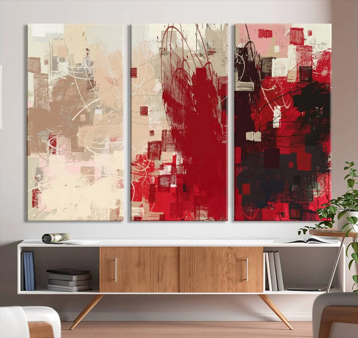 An Abstract Painting Canvas Wall Art in red and beige hues is displayed, ready to hang.