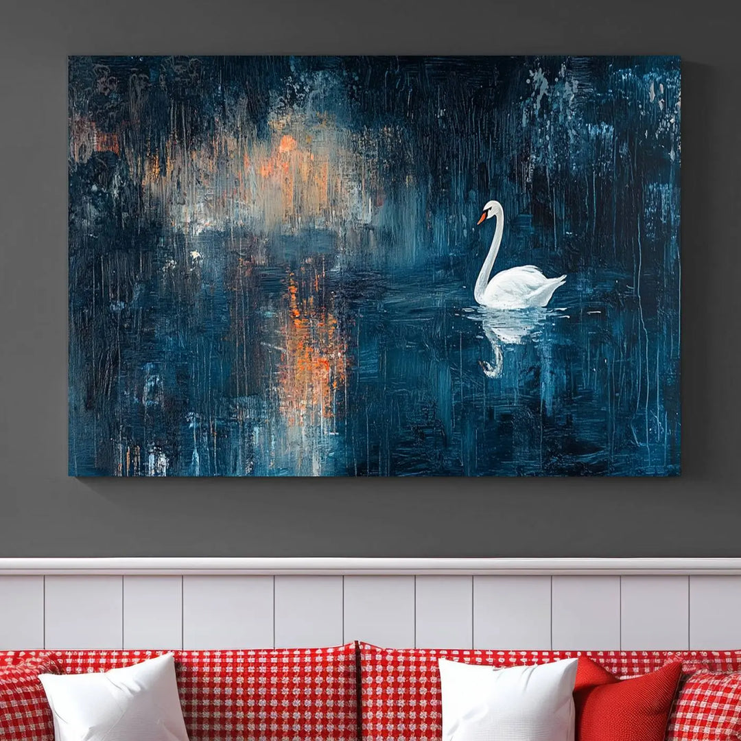 The Abstract Swan Wall Art is a captivating canvas print featuring a moody blue and orange swan on dark water, perfect for enhancing contemporary home decor.