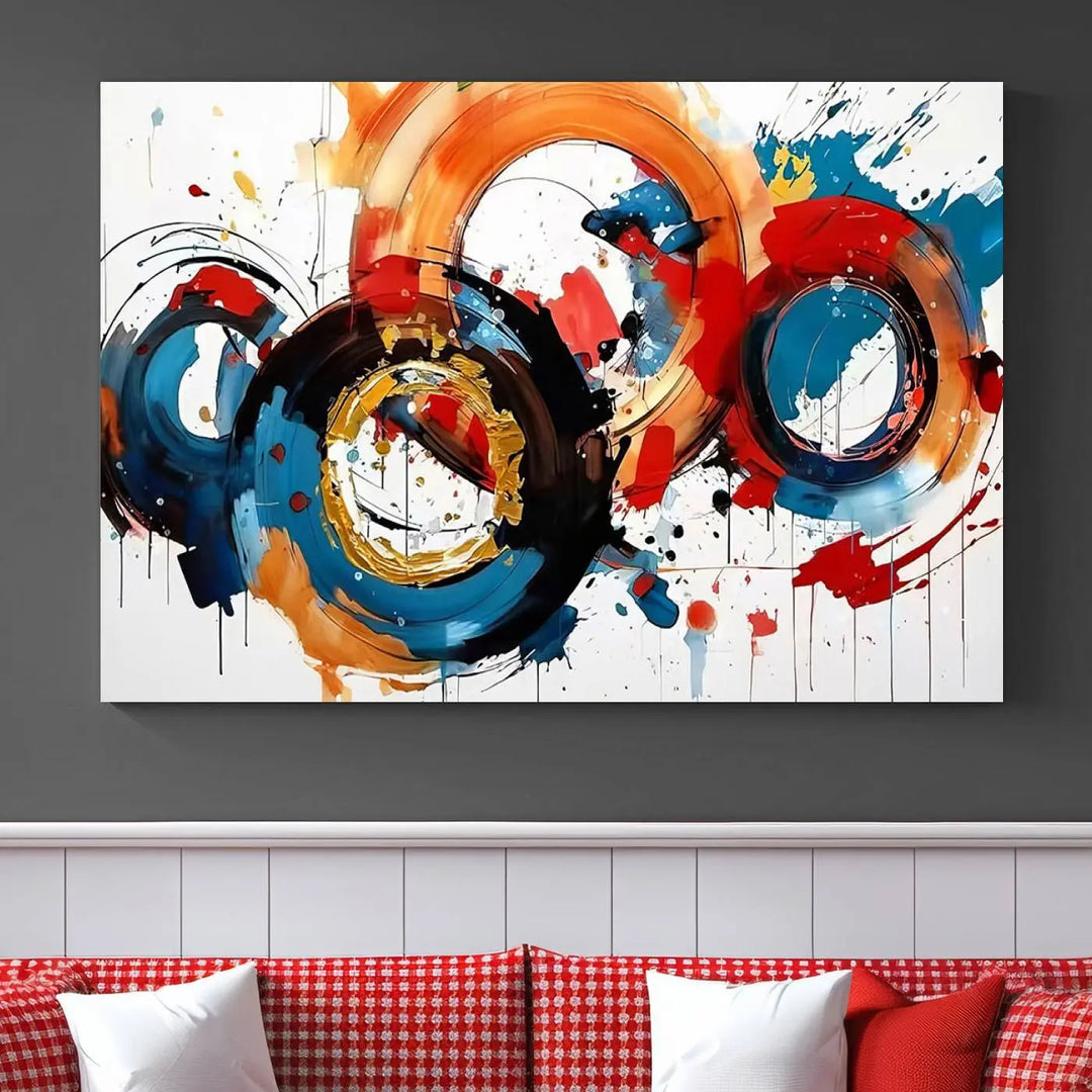 The Abstract Wall Art Rings Canvas Print, with its bold and colorful circular strokes, adorns the wall, epitomizing contemporary design.