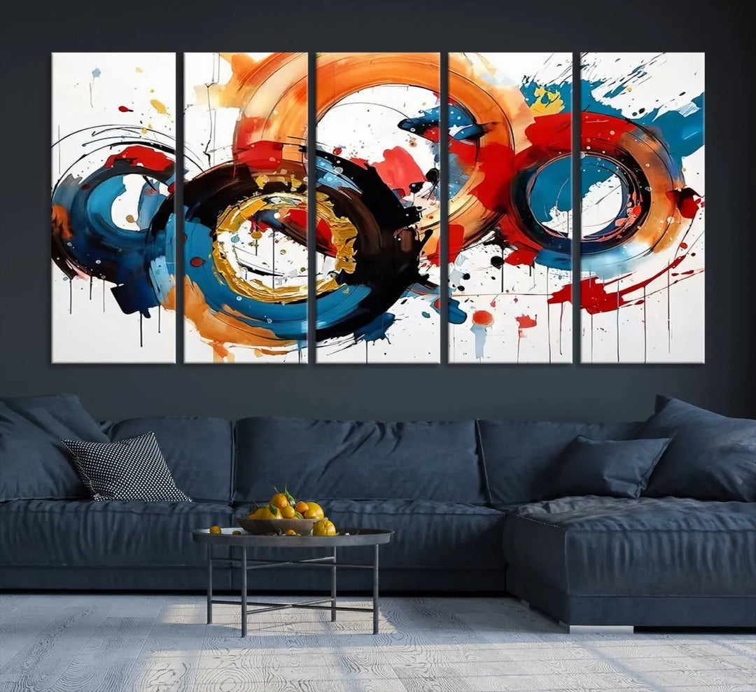 The Abstract Wall Art Rings Canvas Print, with its bold and colorful circular strokes, adorns the wall, epitomizing contemporary design.