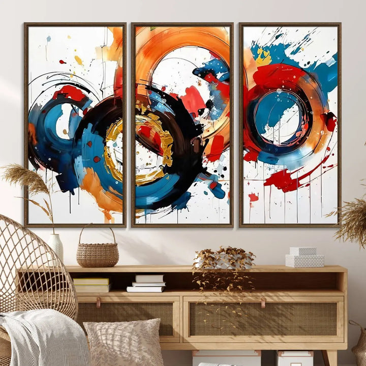 The Abstract Wall Art Rings Canvas Print, with its bold and colorful circular strokes, adorns the wall, epitomizing contemporary design.