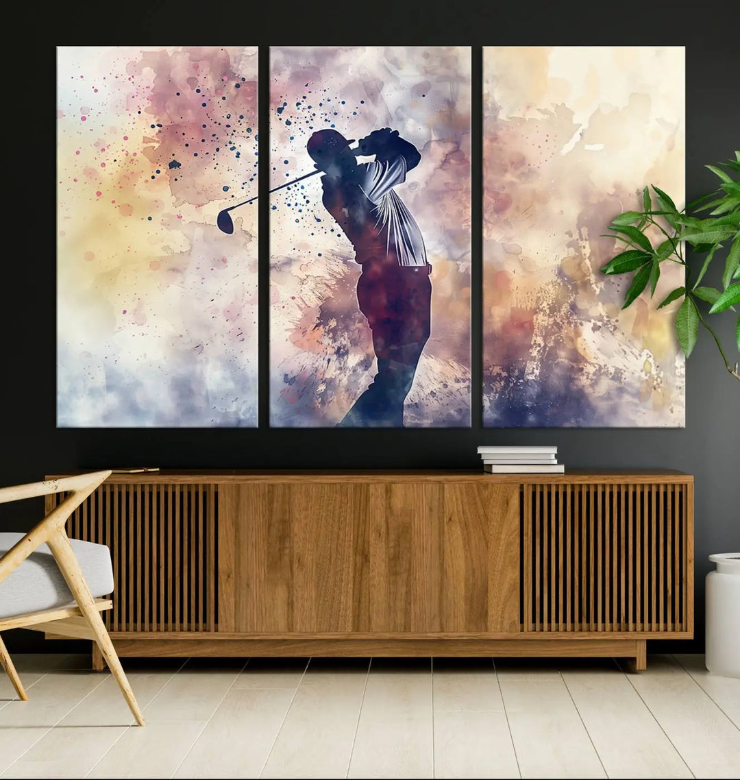 The Abstract Watercolor Golf Player Wall Art Canvas Print, with its vibrant abstract splashes, infuses dynamic energy into the room and harmonizes effortlessly with modern decor. This impressive piece captures the essence of contemporary golf art.