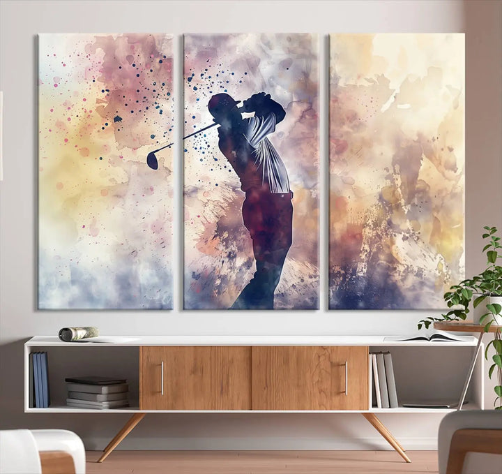 The Abstract Watercolor Golf Player Wall Art Canvas Print, with its vibrant abstract splashes, infuses dynamic energy into the room and harmonizes effortlessly with modern decor. This impressive piece captures the essence of contemporary golf art.