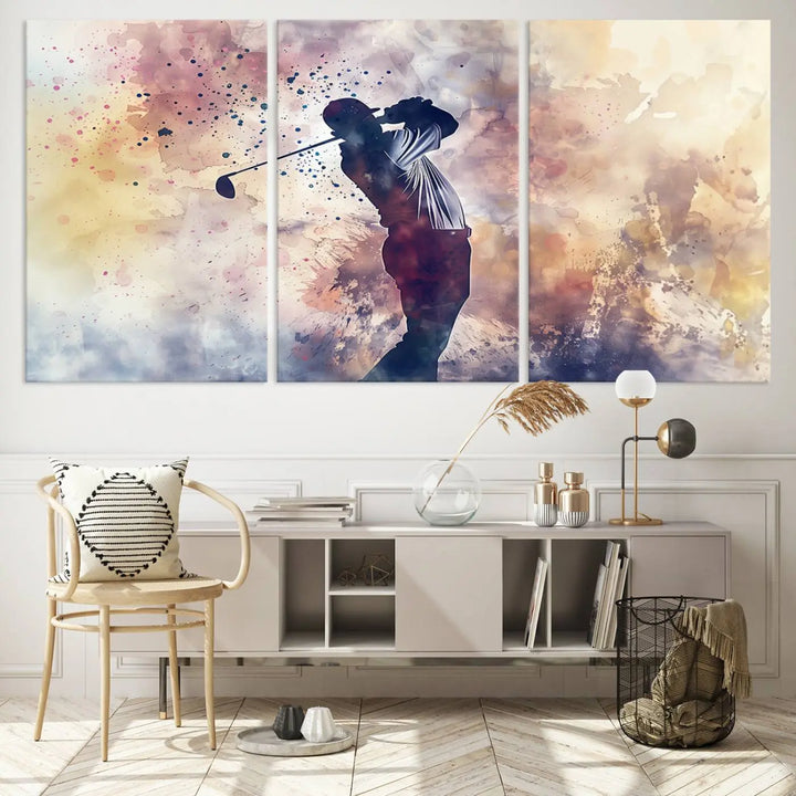 The Abstract Watercolor Golf Player Wall Art Canvas Print, with its vibrant abstract splashes, infuses dynamic energy into the room and harmonizes effortlessly with modern decor. This impressive piece captures the essence of contemporary golf art.