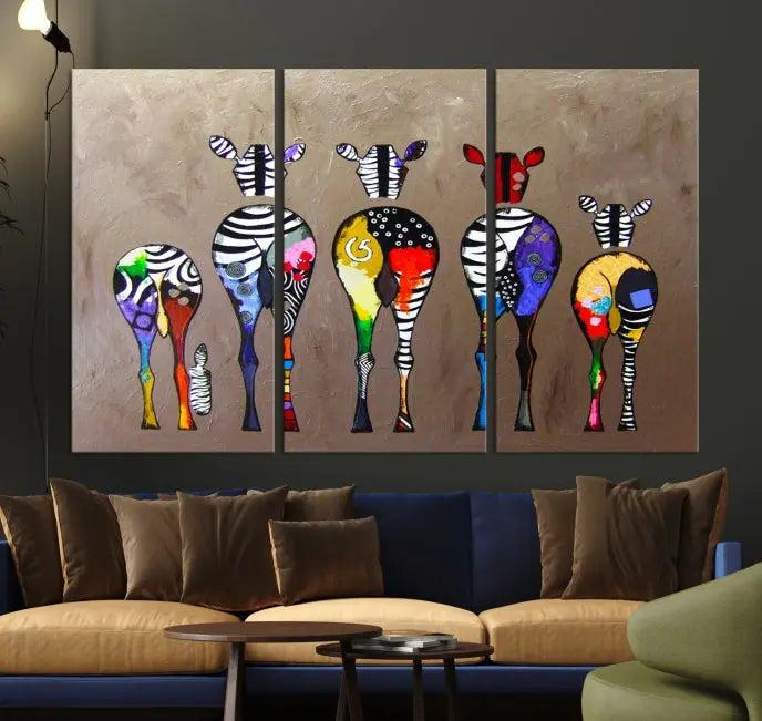 The Abstract Zebras Wall Art Canvas Print features a three-panel design of colorful zebra backs printed on museum-quality canvas. It comes ready to hang for easy installation and is protected with a UV-coating to maintain its vibrant hues.