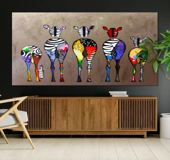 The Abstract Zebras Wall Art Canvas Print features a three-panel design of colorful zebra backs printed on museum-quality canvas. It comes ready to hang for easy installation and is protected with a UV-coating to maintain its vibrant hues.