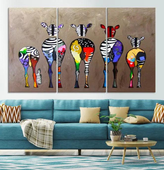 The Abstract Zebras Wall Art Canvas Print features a three-panel design of colorful zebra backs printed on museum-quality canvas. It comes ready to hang for easy installation and is protected with a UV-coating to maintain its vibrant hues.