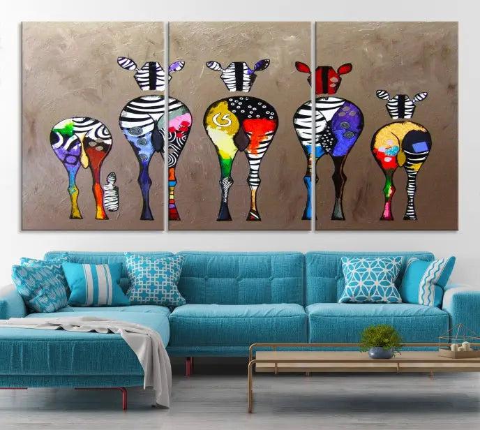 The Abstract Zebras Wall Art Canvas Print features a three-panel design of colorful zebra backs printed on museum-quality canvas. It comes ready to hang for easy installation and is protected with a UV-coating to maintain its vibrant hues.