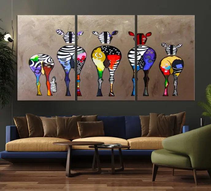 The Abstract Zebras Wall Art Canvas Print features a three-panel design of colorful zebra backs printed on museum-quality canvas. It comes ready to hang for easy installation and is protected with a UV-coating to maintain its vibrant hues.