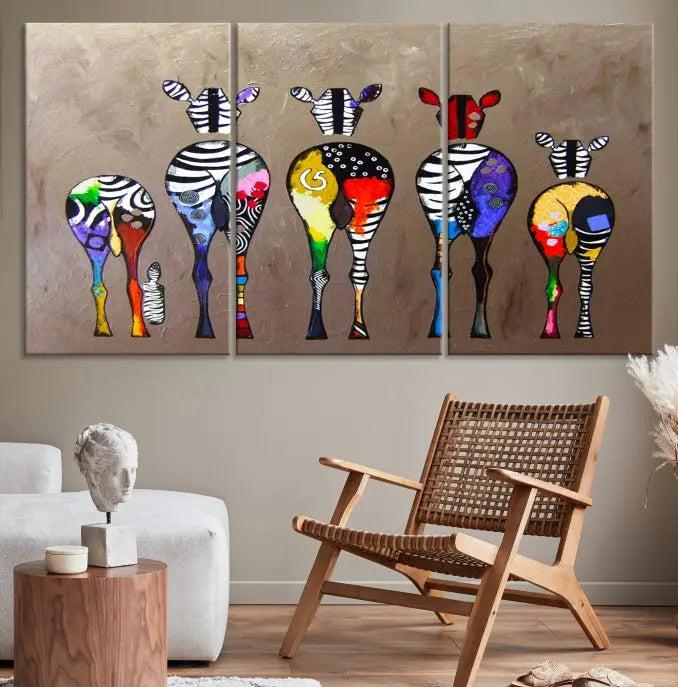 The Abstract Zebras Wall Art Canvas Print features a three-panel design of colorful zebra backs printed on museum-quality canvas. It comes ready to hang for easy installation and is protected with a UV-coating to maintain its vibrant hues.