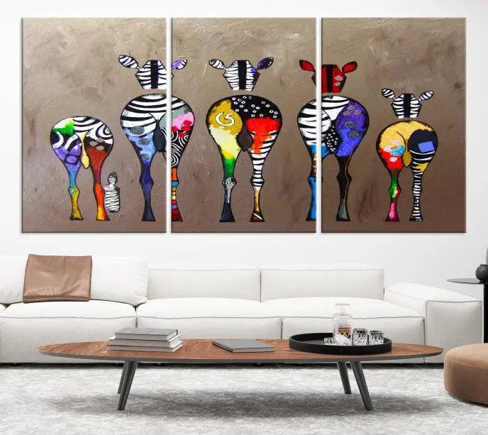 The Abstract Zebras Wall Art Canvas Print features a three-panel design of colorful zebra backs printed on museum-quality canvas. It comes ready to hang for easy installation and is protected with a UV-coating to maintain its vibrant hues.