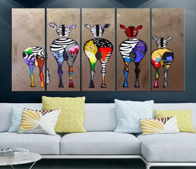 The Abstract Zebras Wall Art Canvas Print features a three-panel design of colorful zebra backs printed on museum-quality canvas. It comes ready to hang for easy installation and is protected with a UV-coating to maintain its vibrant hues.