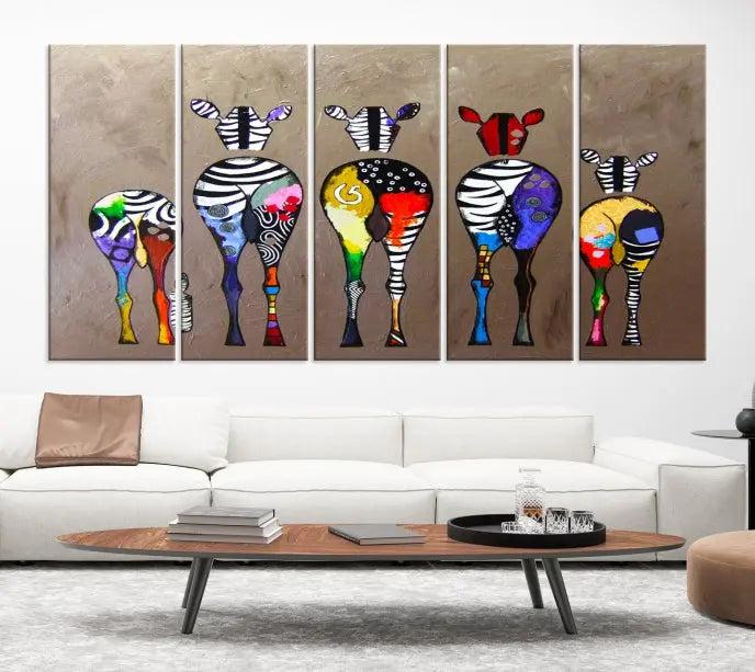 The Abstract Zebras Wall Art Canvas Print features a three-panel design of colorful zebra backs printed on museum-quality canvas. It comes ready to hang for easy installation and is protected with a UV-coating to maintain its vibrant hues.