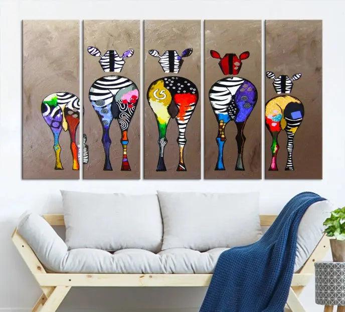 The Abstract Zebras Wall Art Canvas Print features a three-panel design of colorful zebra backs printed on museum-quality canvas. It comes ready to hang for easy installation and is protected with a UV-coating to maintain its vibrant hues.