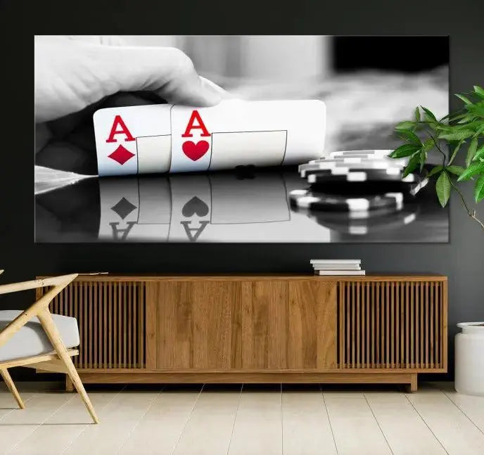 The split image of a poker hand displaying two aces and poker chips on a reflective table is captured in this wall art. Titled "Aces Poker Art Poker Game Wall Art Canvas Print," it is crafted on museum-quality canvas to convey elegance and precision. Enjoy the added perk of free shipping on this masterpiece made in the USA.