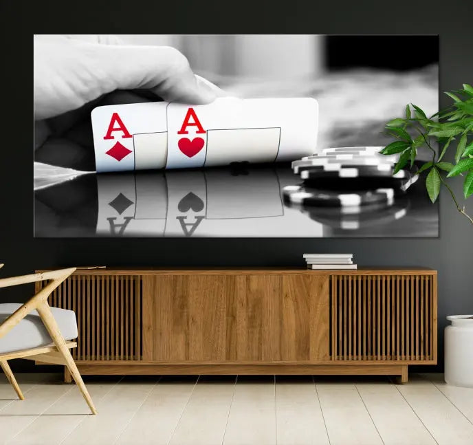 The split image of a poker hand displaying two aces and poker chips on a reflective table is captured in this wall art. Titled "Aces Poker Art Poker Game Wall Art Canvas Print," it is crafted on museum-quality canvas to convey elegance and precision. Enjoy the added perk of free shipping on this masterpiece made in the USA.