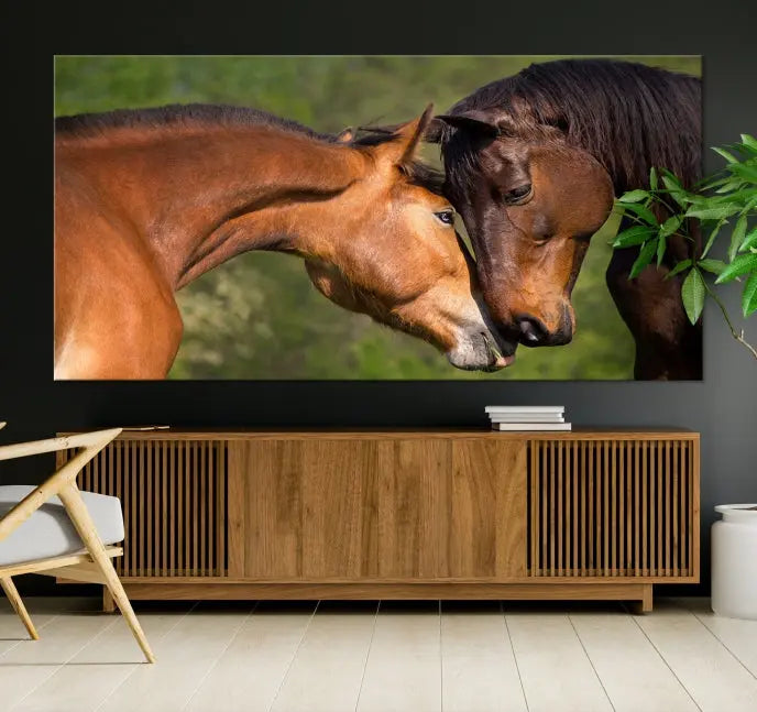 The "Adorable Horse Love Wall Art Animal Canvas Print," a triptych museum-quality canvas, graces the wall, depicting two horses nuzzling. This artwork is ready to hang and includes a UV-protective coating for lasting beauty.