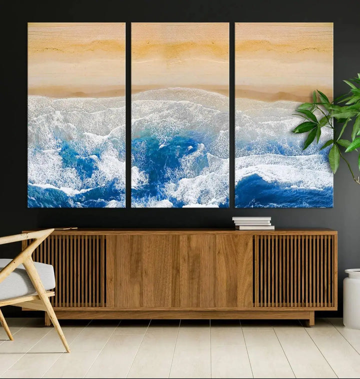 An Aerial Beach Canvas Wall Art Print, an exquisite display on museum-quality canvases, graces the dark wall. This ready-to-hang piece adds a touch of elegance and style to the space.