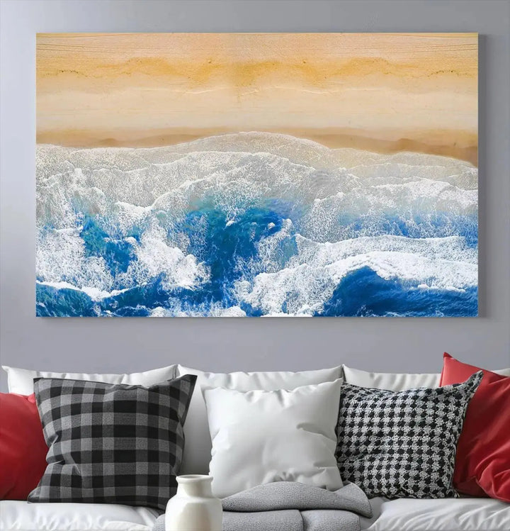 An Aerial Beach Canvas Wall Art Print, an exquisite display on museum-quality canvases, graces the dark wall. This ready-to-hang piece adds a touch of elegance and style to the space.