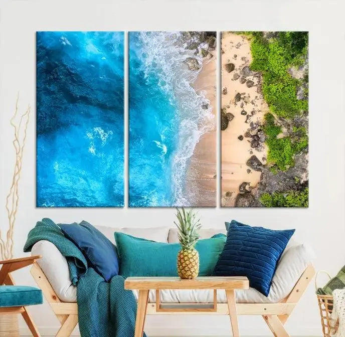 The Aerial Ocean Beach Canvas Wall Art Print is elegantly displayed, boasting a UV-protective coating to ensure enduring vibrancy. This museum-quality canvas piece is prepped for easy hanging.