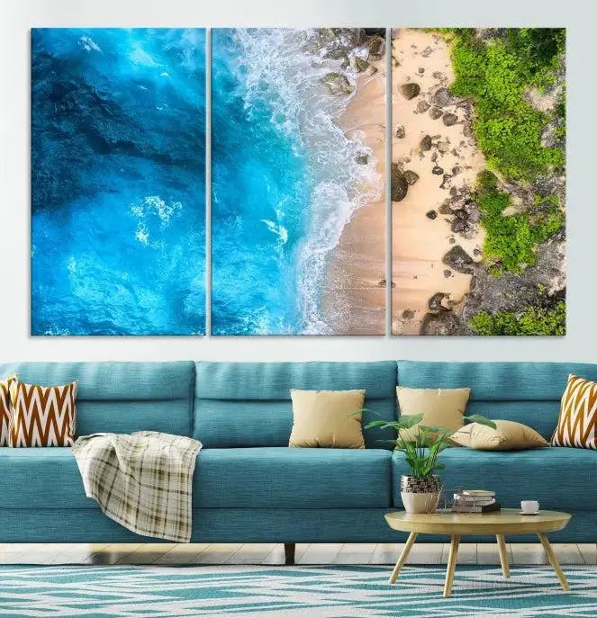 The Aerial Ocean Beach Canvas Wall Art Print is elegantly displayed, boasting a UV-protective coating to ensure enduring vibrancy. This museum-quality canvas piece is prepped for easy hanging.