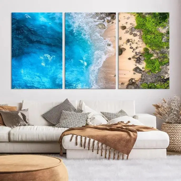 The Aerial Ocean Beach Canvas Wall Art Print is elegantly displayed, boasting a UV-protective coating to ensure enduring vibrancy. This museum-quality canvas piece is prepped for easy hanging.