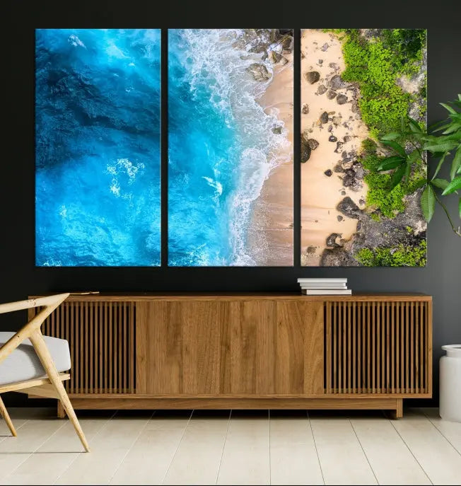 The Aerial Ocean Beach Canvas Wall Art Print is elegantly displayed, boasting a UV-protective coating to ensure enduring vibrancy. This museum-quality canvas piece is prepped for easy hanging.