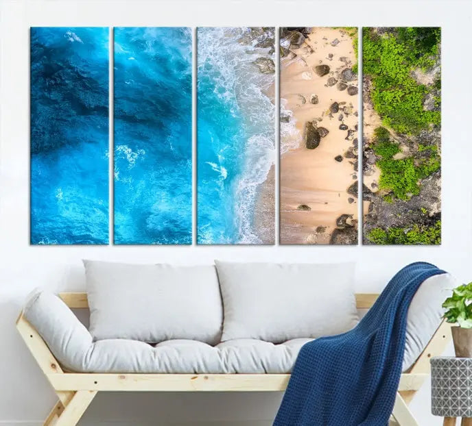 The Aerial Ocean Beach Canvas Wall Art Print is elegantly displayed, boasting a UV-protective coating to ensure enduring vibrancy. This museum-quality canvas piece is prepped for easy hanging.