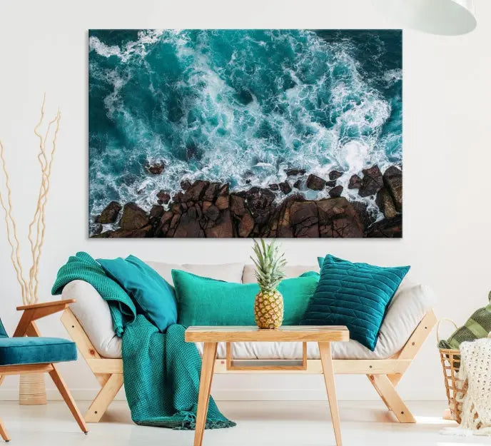 The "Aerial Ocean Wall Art Canvas Print," crafted from polycotton canvas, adorns the wall and adds museum-quality elegance to your space. This ready-to-hang artwork is a striking addition to any room.