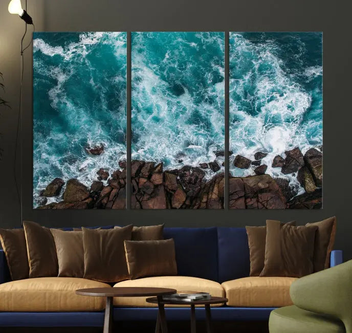 The "Aerial Ocean Wall Art Canvas Print," crafted from polycotton canvas, adorns the wall and adds museum-quality elegance to your space. This ready-to-hang artwork is a striking addition to any room.