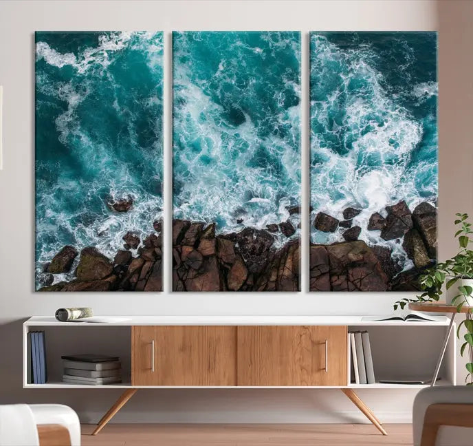 The "Aerial Ocean Wall Art Canvas Print," crafted from polycotton canvas, adorns the wall and adds museum-quality elegance to your space. This ready-to-hang artwork is a striking addition to any room.