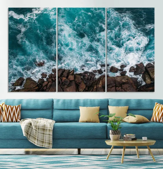 The "Aerial Ocean Wall Art Canvas Print," crafted from polycotton canvas, adorns the wall and adds museum-quality elegance to your space. This ready-to-hang artwork is a striking addition to any room.