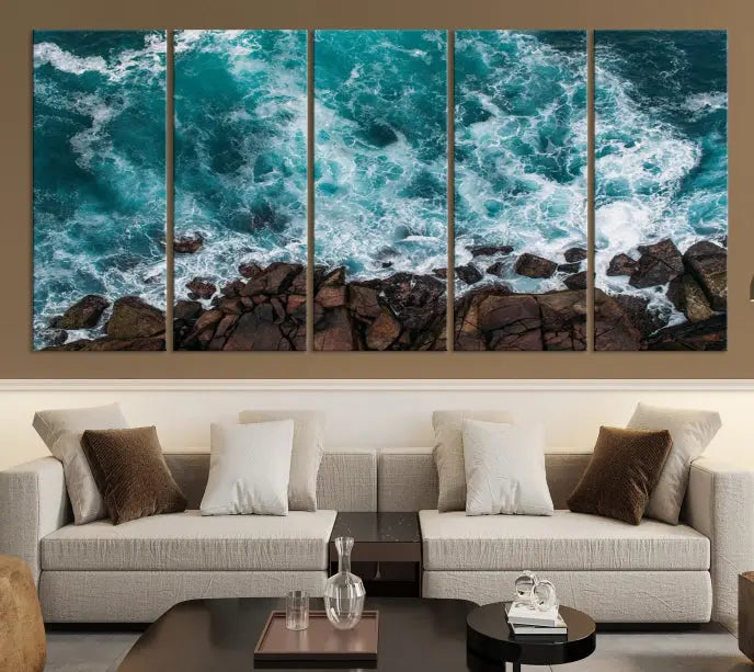 The "Aerial Ocean Wall Art Canvas Print," crafted from polycotton canvas, adorns the wall and adds museum-quality elegance to your space. This ready-to-hang artwork is a striking addition to any room.