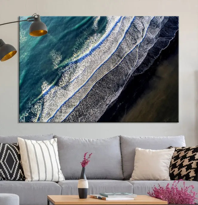 The Aerial Seashore Ocean Wall Art Canvas Print features an aerial view of ocean waves on museum-quality canvases with hand-assembled frames.