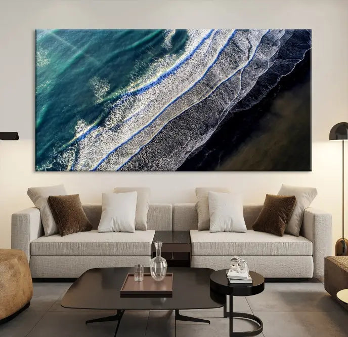 The Aerial Seashore Ocean Wall Art Canvas Print features an aerial view of ocean waves on museum-quality canvases with hand-assembled frames.