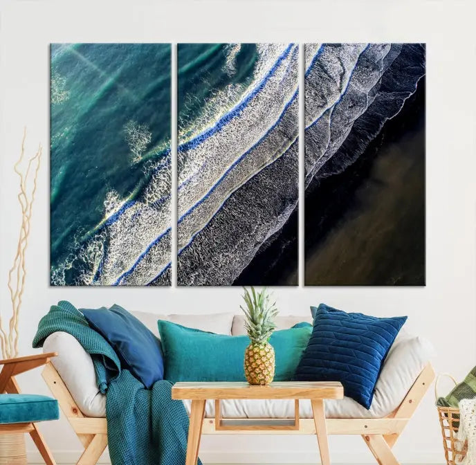 The Aerial Seashore Ocean Wall Art Canvas Print features an aerial view of ocean waves on museum-quality canvases with hand-assembled frames.