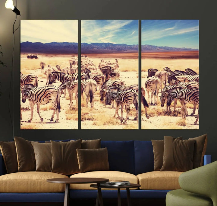 The Africa Zebras in the Savannah Canvas Wall Art Print features a zebra triptych on museum-quality canvas. This gallery-wrapped artwork is finished with a UV-protective coating, ensuring lasting vibrancy and elegance.