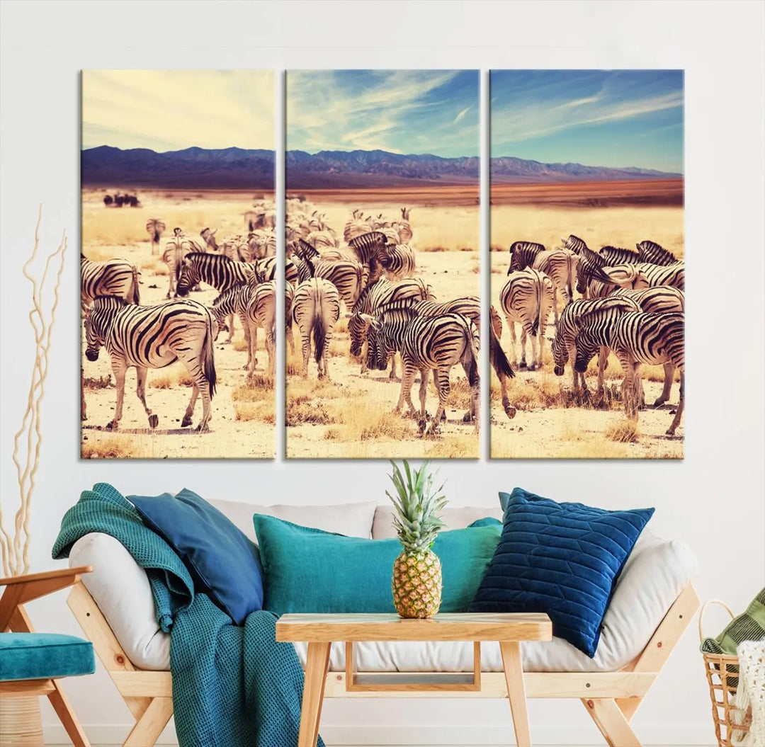 The Africa Zebras in the Savannah Canvas Wall Art Print features a zebra triptych on museum-quality canvas. This gallery-wrapped artwork is finished with a UV-protective coating, ensuring lasting vibrancy and elegance.