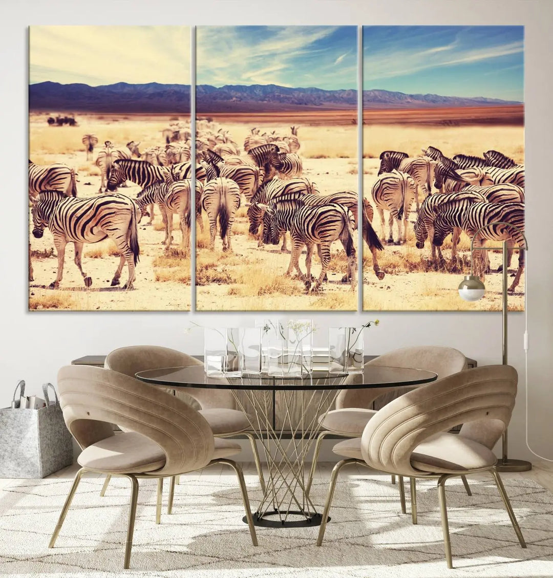 The Africa Zebras in the Savannah Canvas Wall Art Print features a zebra triptych on museum-quality canvas. This gallery-wrapped artwork is finished with a UV-protective coating, ensuring lasting vibrancy and elegance.