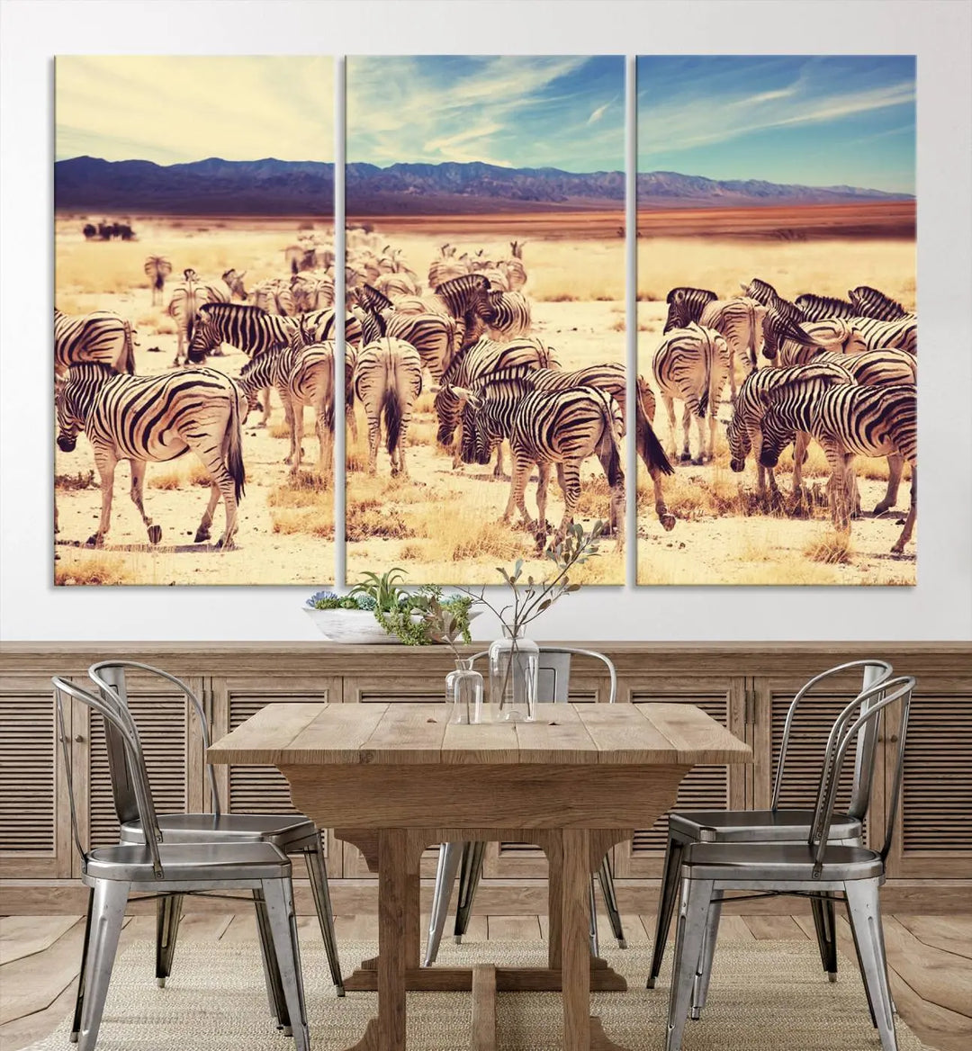 The Africa Zebras in the Savannah Canvas Wall Art Print features a zebra triptych on museum-quality canvas. This gallery-wrapped artwork is finished with a UV-protective coating, ensuring lasting vibrancy and elegance.